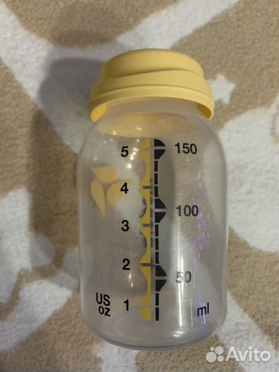 Medela mini electric молокоотсос+накладки на грудь