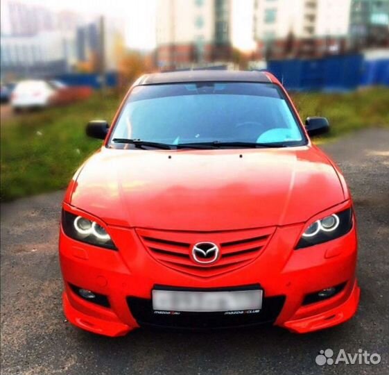 Клыки переднего бампера Мазда 3 bk