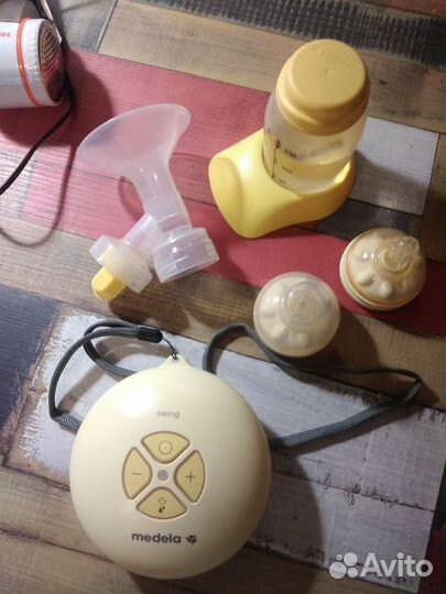 Молокоотсос medela электрический