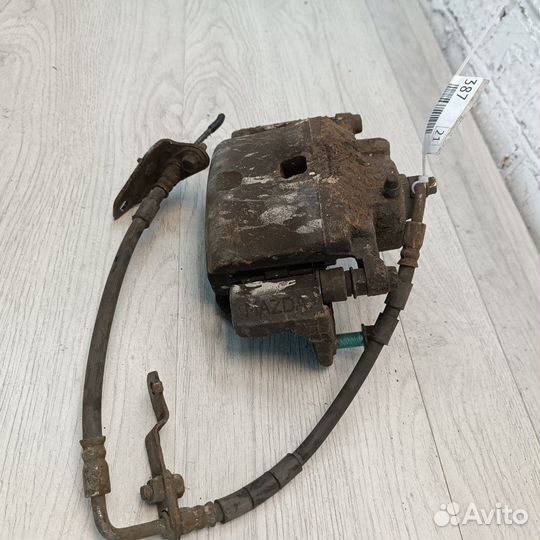 Суппорт тормозной передний левый Mazda 6 GH 2.5