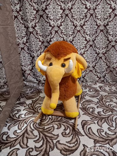 Детская игрушка качалка