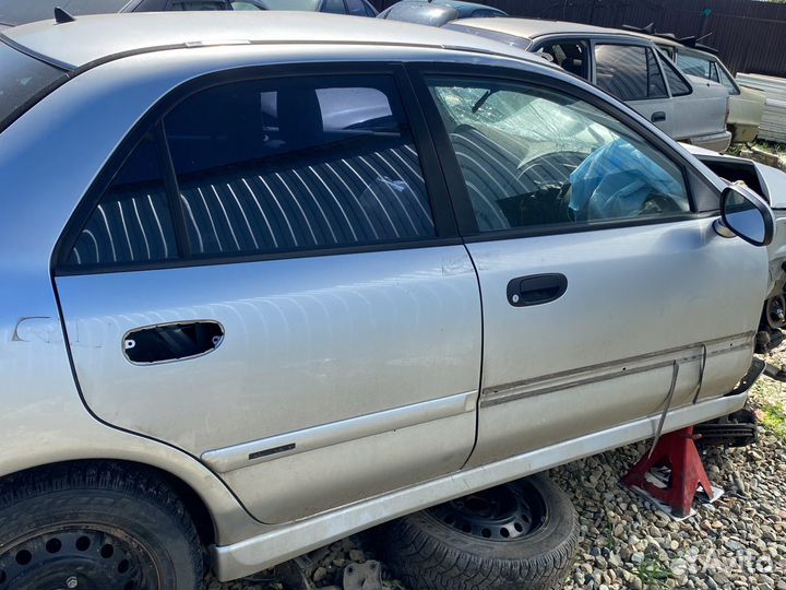 Дверь Mitsubishi Carisma