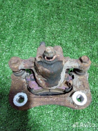 Суппорт тормозной задний правый Kia Optima JF G4ND