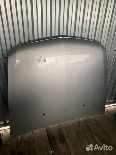 Капот Cadillac STS