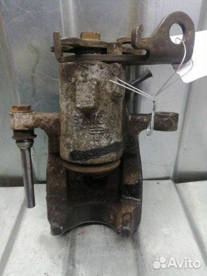 Суппорт тормозной задний левый Renault Megane 3