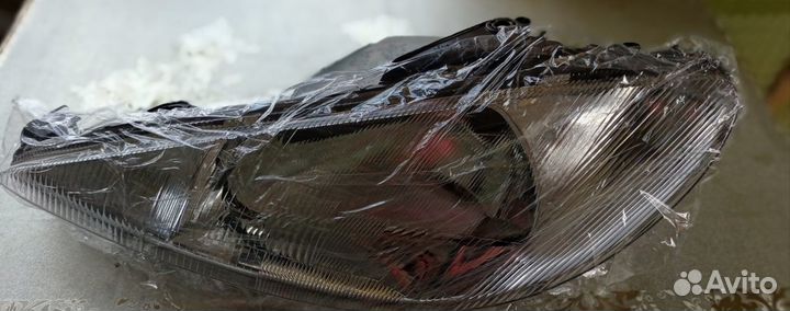 Фара peugeot 206