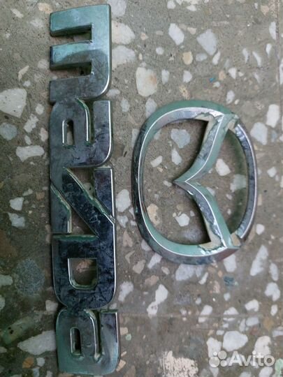 Эмблема Мазда mpv