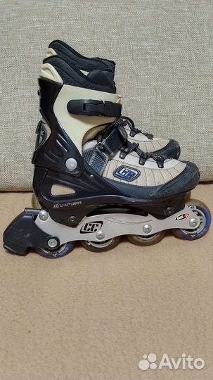 Роликовые коньки