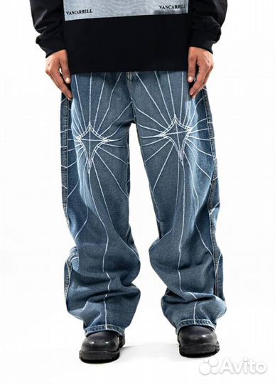 Джинсы оверсайз Thug Club на руках