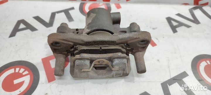 Суппорт тормозной задний левый Mitsubishi Airtrek