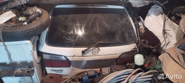 Задняя дверь Mazda cappella