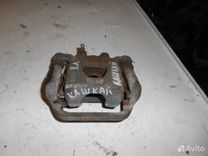 Суппорт задний левый Nissan Qashqai J10