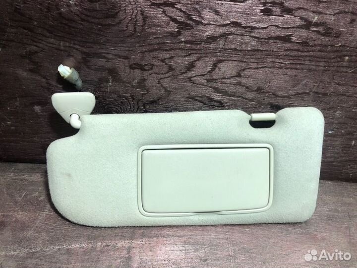 Козырек солнцезащитный передний левый Nissan