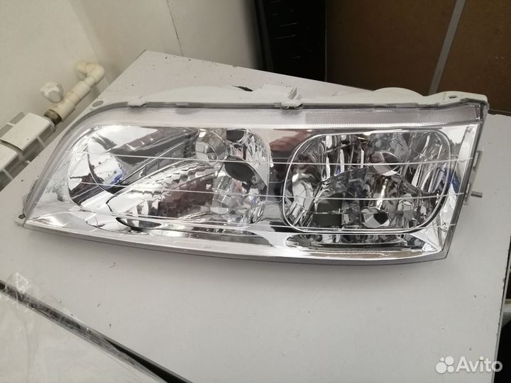 Фара левая toyota mark II 96-01