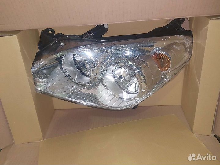 Фара левая Opel Astra h хром