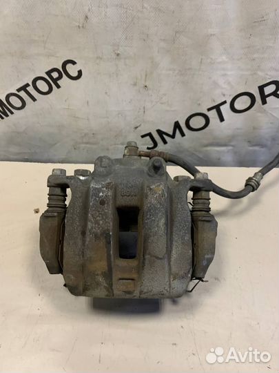 Суппорт тормозной Nissan Murano Z51 передний левый