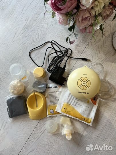 Молокоотсос medela электрический