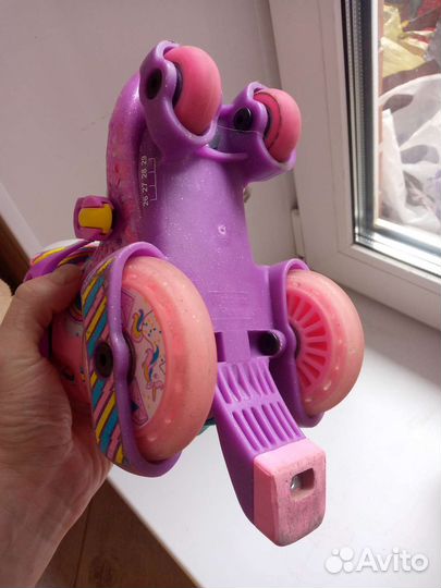 Роликовые коньки