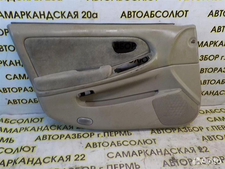 Обшивка двери передней левой Nissan Maxima (A33)