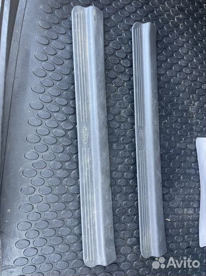 Накладки порогов киа спектра