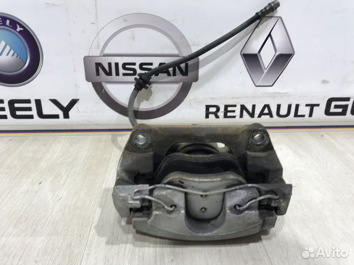 Суппорт тормозной перед Renault megane 2 Лев