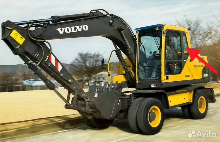 Стекло левое за дверью на экскаватор Volvo EW 145