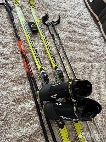 Беговые лыжи и ботинки fischer