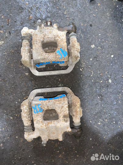 Суппорт тормозной задний Nissan Qashqai J10