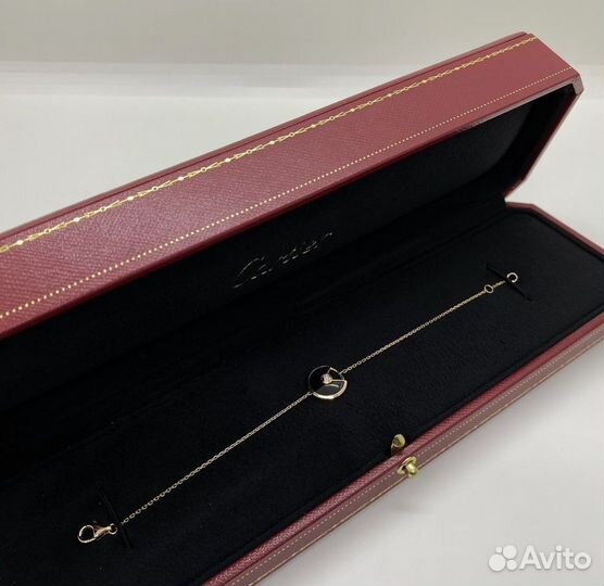 Золотой браслет Cartier с ониксом и брил