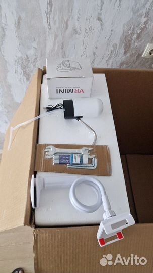 Гребной тренажер новый