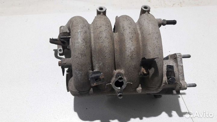 Впускной коллектор Hyundai Getz G4EE