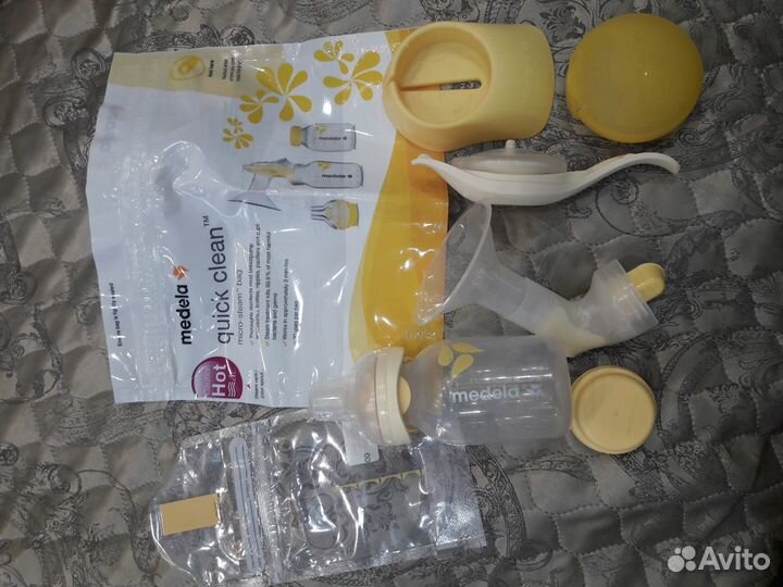 Набор Medela молокоотсос calma и накладки для соск