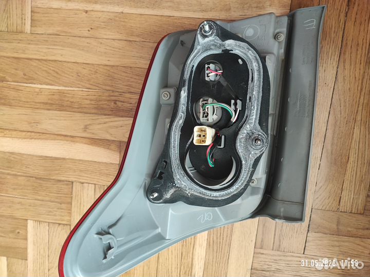 Задний фонарь левый toyota corolla fielder NZE 141