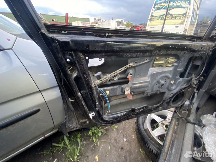 Передняя левая дверь Kia Spectra