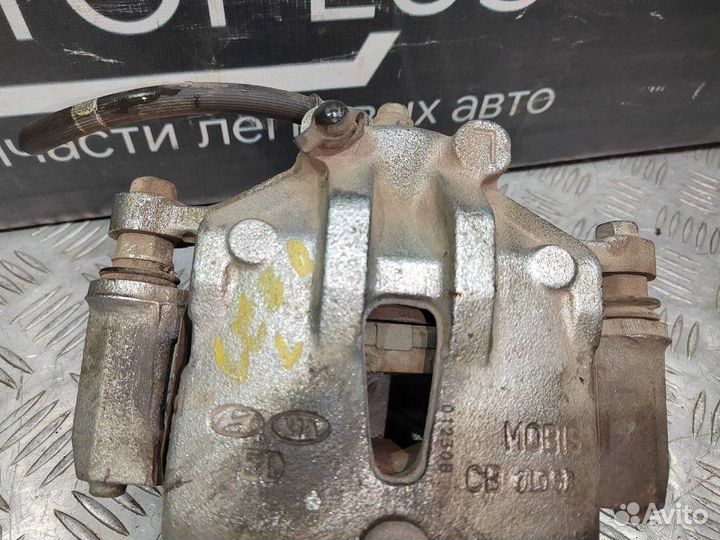 Суппорт тормозной передний левый Kia Ceed ED