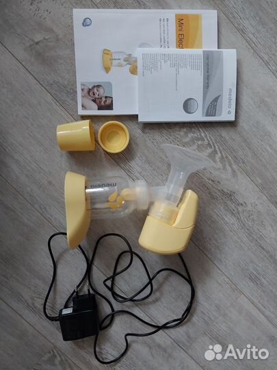 Молокоотсос medela электрический