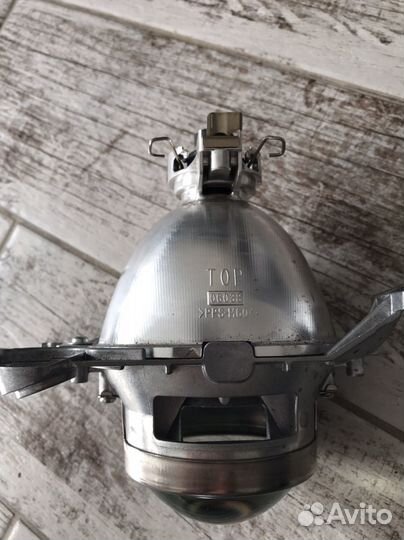 Линза в фару Subaru Legacy