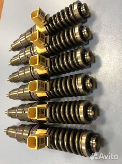 Насос форсунки Volvo FH12 21340611