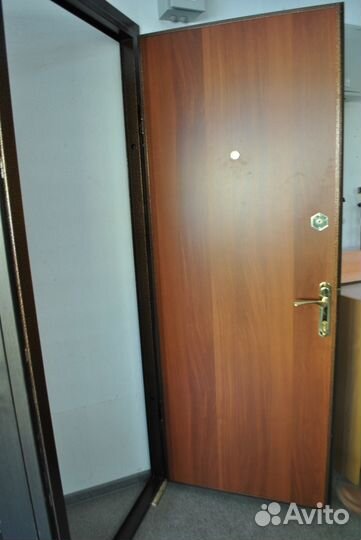 Квартирные стальные двери с отделкой ламинат