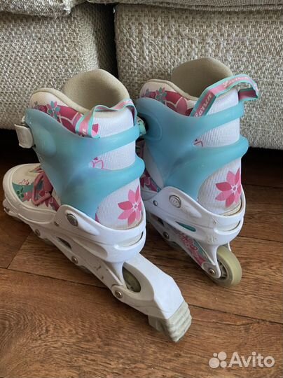 Роликовые коньки женские