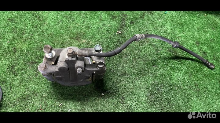 Суппорт тормозной задний правый Mazda CX-9 1