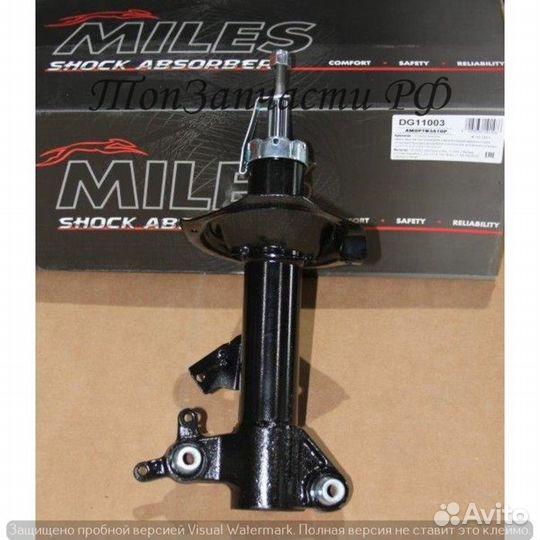 Амортизатор nissan primera P12 пер.лев.газ