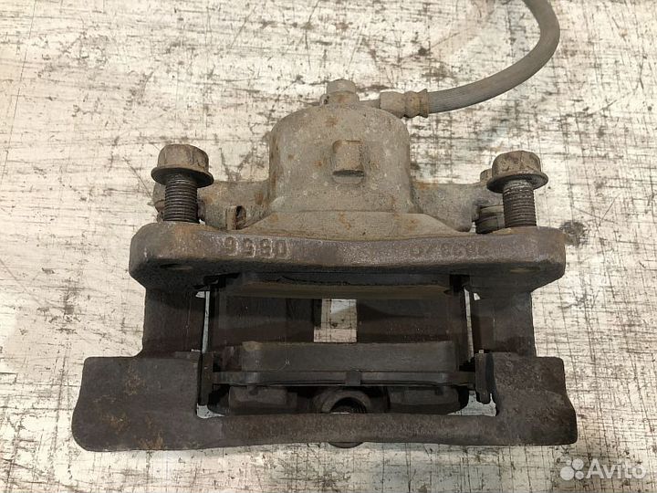 Суппорт тормозной Toyota Corolla E120