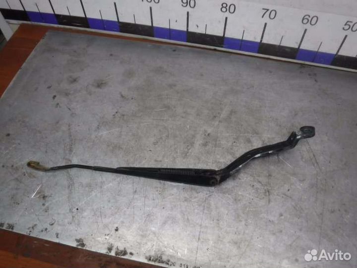 Поводок дворника передний левый Nissan Almera