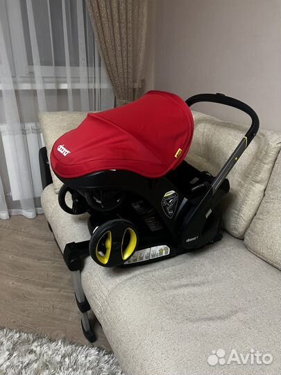 Автолюлька doona + база isofix