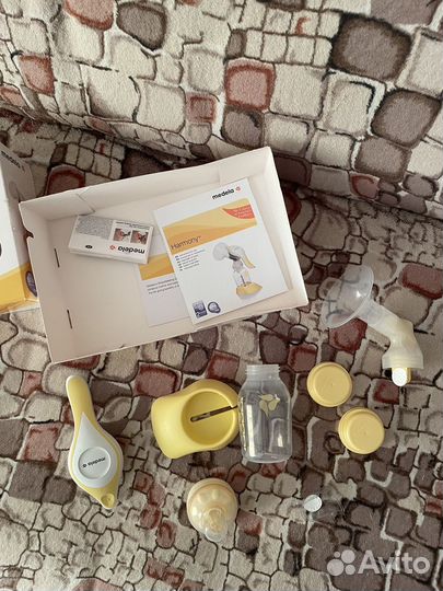 Молокоотсос medela ручной