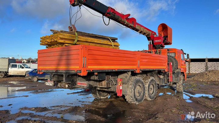 Камаз вездеход. Монипулятор с буровой установкой