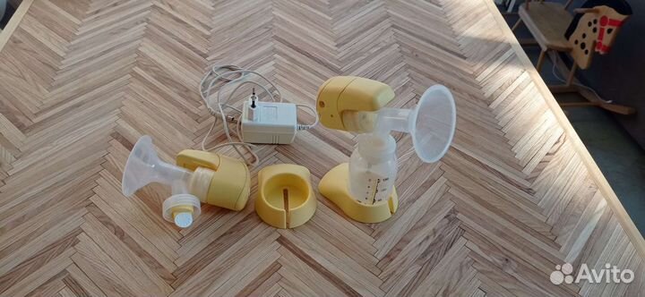 Молокоотсос medela электрический