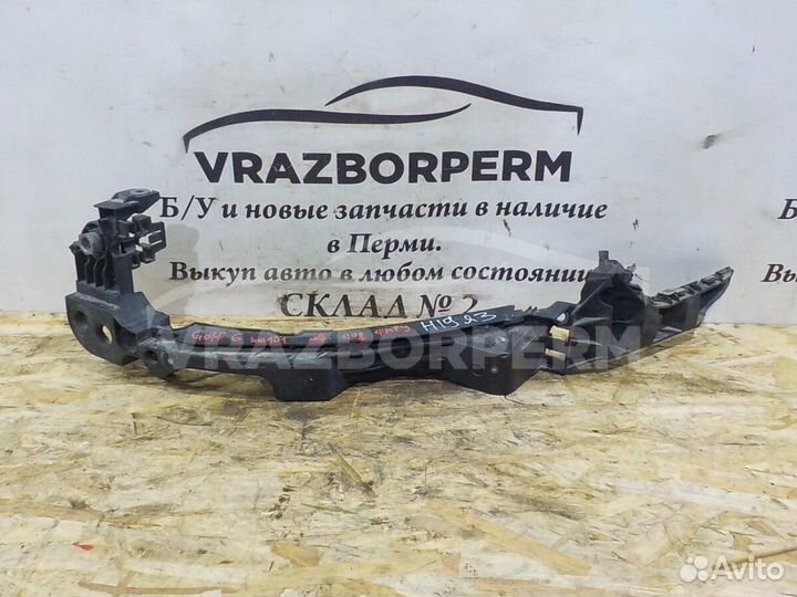 Кронштейн фары левой VW Golf