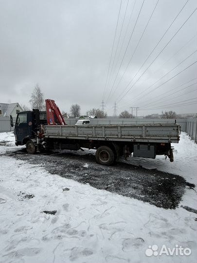 Бортовой грузовик TATA 613 с КМУ AMCO VEBA, 2010